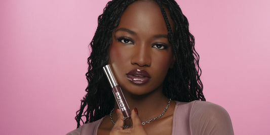 Model wearing NEW Dolly Deep - a mauve brown that is universally flattering on all skintones.